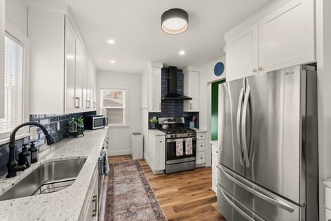 Fully equipped kitchen 🍳✨ cook with ease using stainless steel appliances and plenty of counter space.