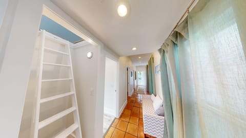 Stairway to loft with Queen bed