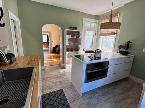 Stainless appliances with fully stocked kitchen. Relax at the breakfast bar