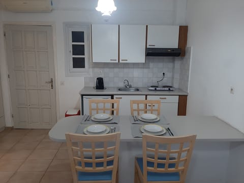 Apartment, 1 Bedroom | Private kitchen | Fridge, stovetop, electric kettle, cookware/dishes/utensils