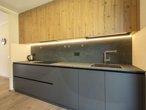 Countertop, Kitchen, Wood, Flooring, Interior Design, Cabinetry, Floor, Sink, Plumbing Fixture, Kitchen Appliance