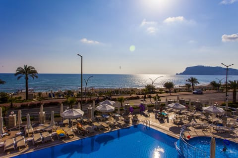 Seasonal outdoor pool, pool umbrellas, sun loungers