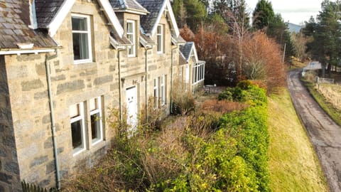 The stone exterior of this four-bedroom holiday home in Highland village of Laggan