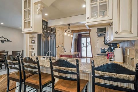 Start your day with coffee, conversation, and alpine views from this charming kitchen perch.