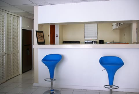 Apartment, 1 Bedroom | Private kitchen | Full-size fridge, microwave, stovetop, cookware/dishes/utensils