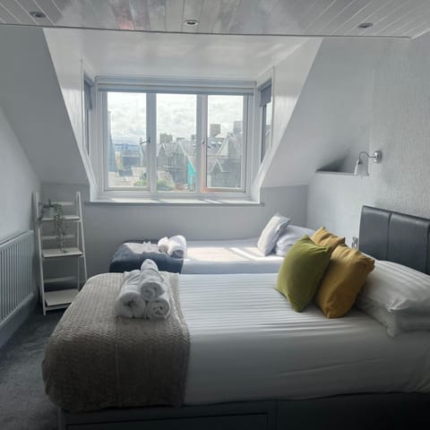 Triple Room, Partial Sea View | Desk, iron/ironing board, free WiFi