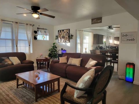 Reclining Couch and chair, Fireplace and 60in w/ Roku karaoke bluetooth speaker. Slingshot available for rent see in photos