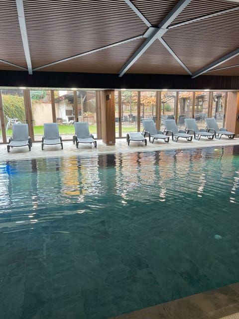 Indoor pool, sun loungers