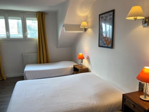 Family Triple Room, City View | Free WiFi, bed sheets