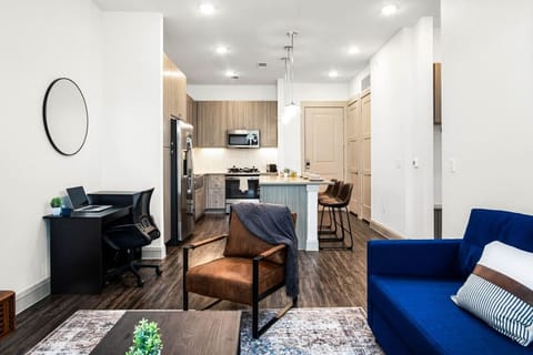 Relax in this warm, inviting space with warm accents and cozy furnishings. You’ll love unwinding on the plush sofa, enjoying or streaming your favorite shows in a serene atmosphere