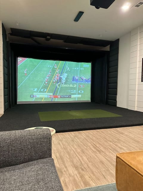 You feel a sense of peace as you step into the living room , with its inviting decor and soothing tones.