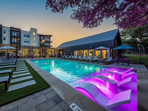 Sparkling private pool with lounge chairs and plenty of space to soak up the sun, ideal for lazy afternoons and refreshing dips.
