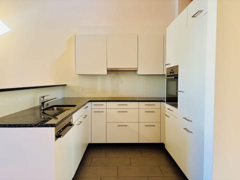 Comfort Apartment, Courtyard View | Private kitchen | Full-size fridge, microwave, oven, stovetop