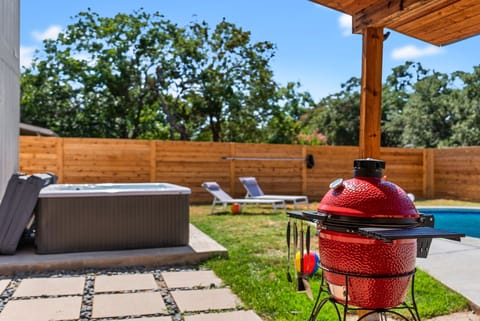 Functional hot tub and kamando joe grill