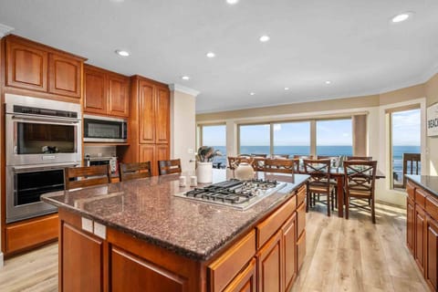 Cook delicious meals for breakfast, lunch, and dinner in this spacious, fully equipped kitchen. We suggest grabbing some seafood from a local market.