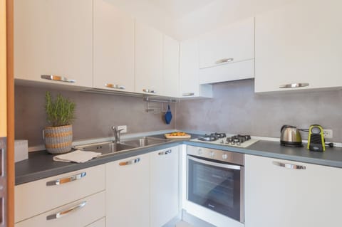 Apartment (1 Bedroom) | Private kitchenette | Oven, espresso maker, electric kettle, highchair