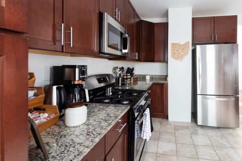 The stainless steel appliances really shine in this space, making the kitchen feel modern.