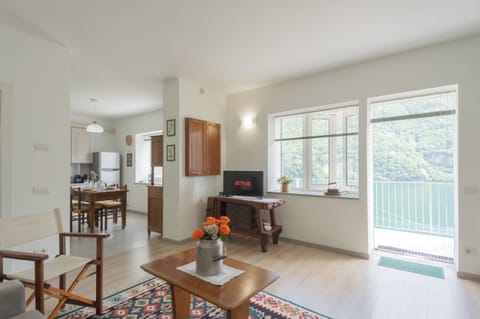 Apartment (2 Bedrooms) | Living area | 32-inch flat-screen TV with cable channels