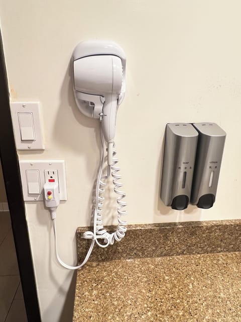 Hair dryer, towels, soap, shampoo