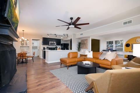 Experience open-concept living at its finest, where the living room, kitchen, and game room seamlessly come together.