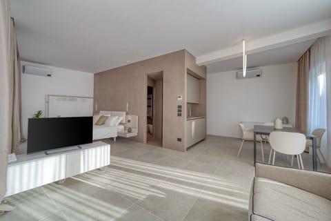 Superior Studio Suite, City View | Living area | 55-inch Smart TV with digital channels, Netflix, streaming services