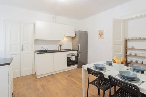 Apartment (2 Bedrooms) | Living area | 32-inch flat-screen TV with cable channels