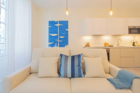 Apartment (1 Bedroom) | Living area | 32-inch flat-screen TV with cable channels