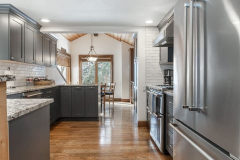 Fully Equipped Kitchen with New Appliances and Granite Countertops