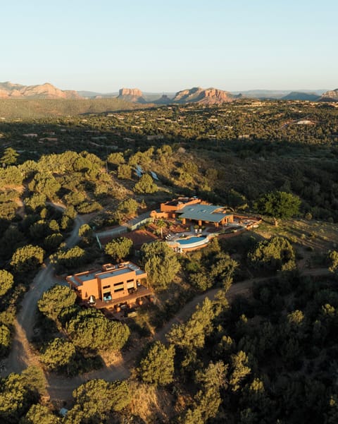 Ariel View of the Villa (on left) and the main home with the shared infinity pool.