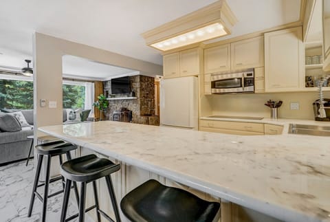 Kitchen with seating for 10 in the Upper Level Kitchen