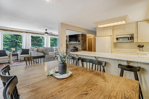 Dining table seats 6 comfortable and 4 barstools at counter