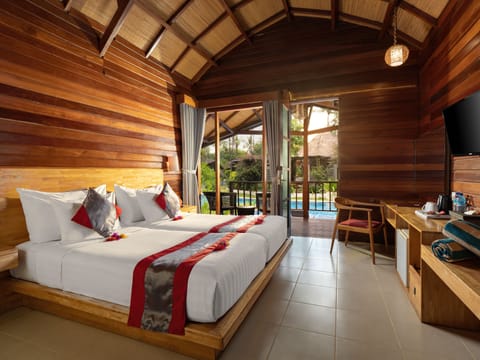 Room, 1 Bedroom, Lagoon View | Minibar, in-room safe, desk, rollaway beds