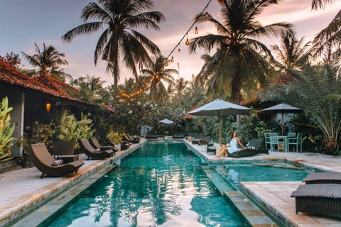 Outdoor pool, pool umbrellas, sun loungers