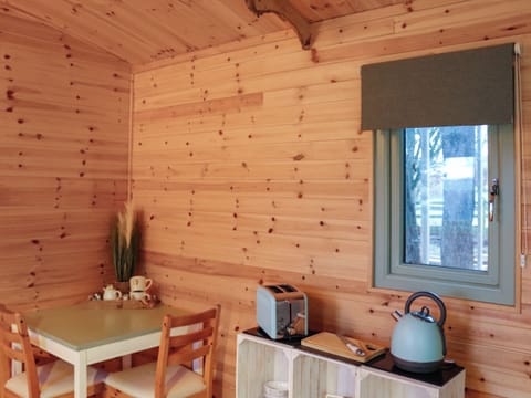 Kitchen area | Shepherds Hut One - Island Hut Retreats, Rhosmeirch, near Benllech