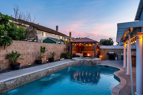 Evenings feel a little slower out here, with the private backyard pool glowing under the sunset and cozy seating waiting beneath the gazebo. Whether it’s a family swim or a quiet night by the fire pit, this is the kind of Southern California getaway guest