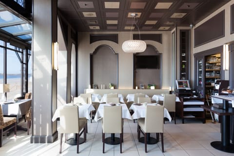 Lunch, dinner served; French cuisine, beach views