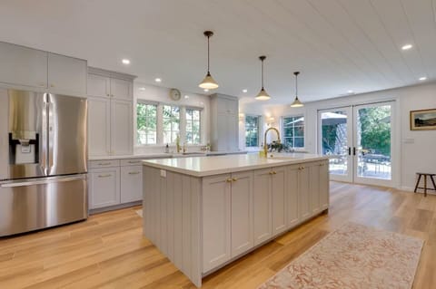 A bright, fully equipped kitchen ready for cooking and connection.