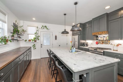 The elegant, open kitchen offers ample space & all the comforts of home