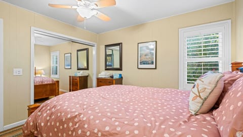 Cozy bedroom providing the most comfort with a queen bed, vast closet space and windows.