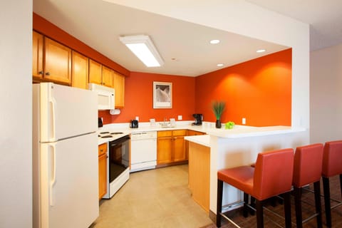 Suite, 1 Double Bed | Private kitchen | Fridge, microwave, stovetop, dishwasher