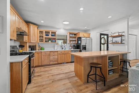 Front entry leads into open concept kitchen, living, & dining! Pantry in hall!