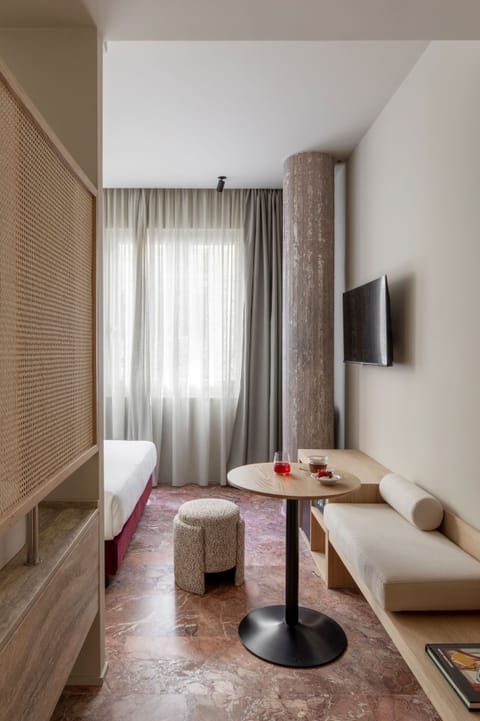 Double or Twin Room | Living area | 42-inch flat-screen TV with digital channels