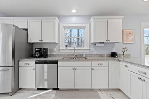 Bright, spacious, and well equipped-- this kitchen is the perfect place to cook relax, and enjoy your stay! Has a dishwasher for added convenience.