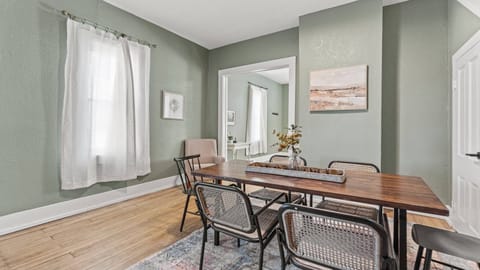 Charming dining space perfect for gathering, enjoying meals, or playing board games.