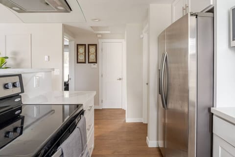 Kitchen view facing the two bedrooms