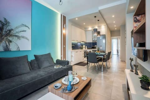 Luxury Apartment, City View | Living area | 55-inch Smart TV with satellite channels, video-game console