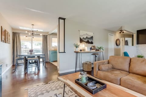 Spacious Living Room with Comfy Seating, Large Smart TV and Plenty Of Natural Light