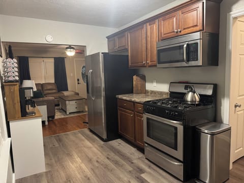 MAIN LEVEL, KITCHEN: Fully Equipped Kitchen open into the Living Room