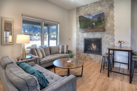 Living room - Living room with gas fireplace and mountain views.