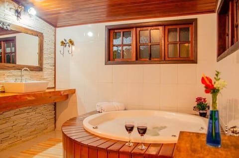 Separate tub and shower, jetted tub, towels, soap